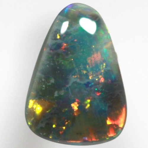SOLID BLACK OPAL Bright and sparkling gold, cherry red over blue